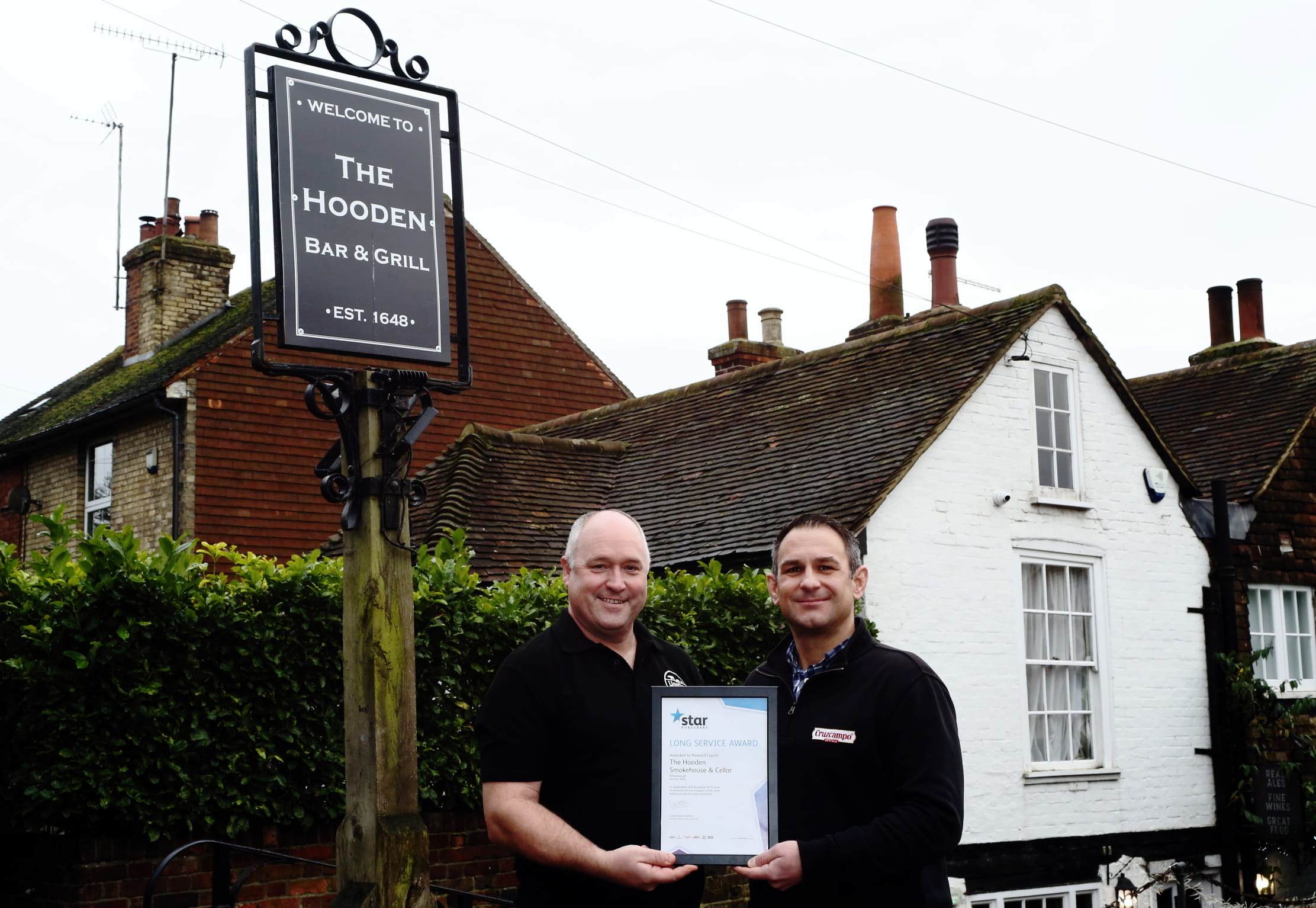 Willesborough licensee receives prestigious award to mark 25 years behind the bar