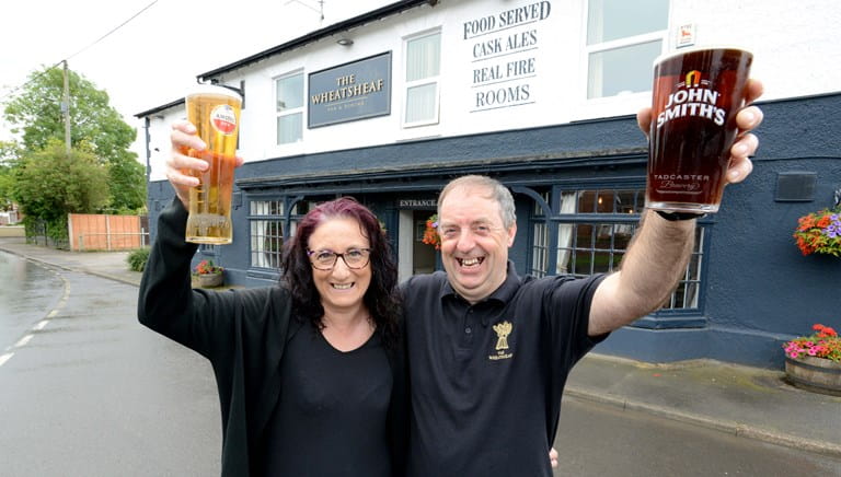 Cheers! North Lincolnshire village's only pub reopens after major revamp