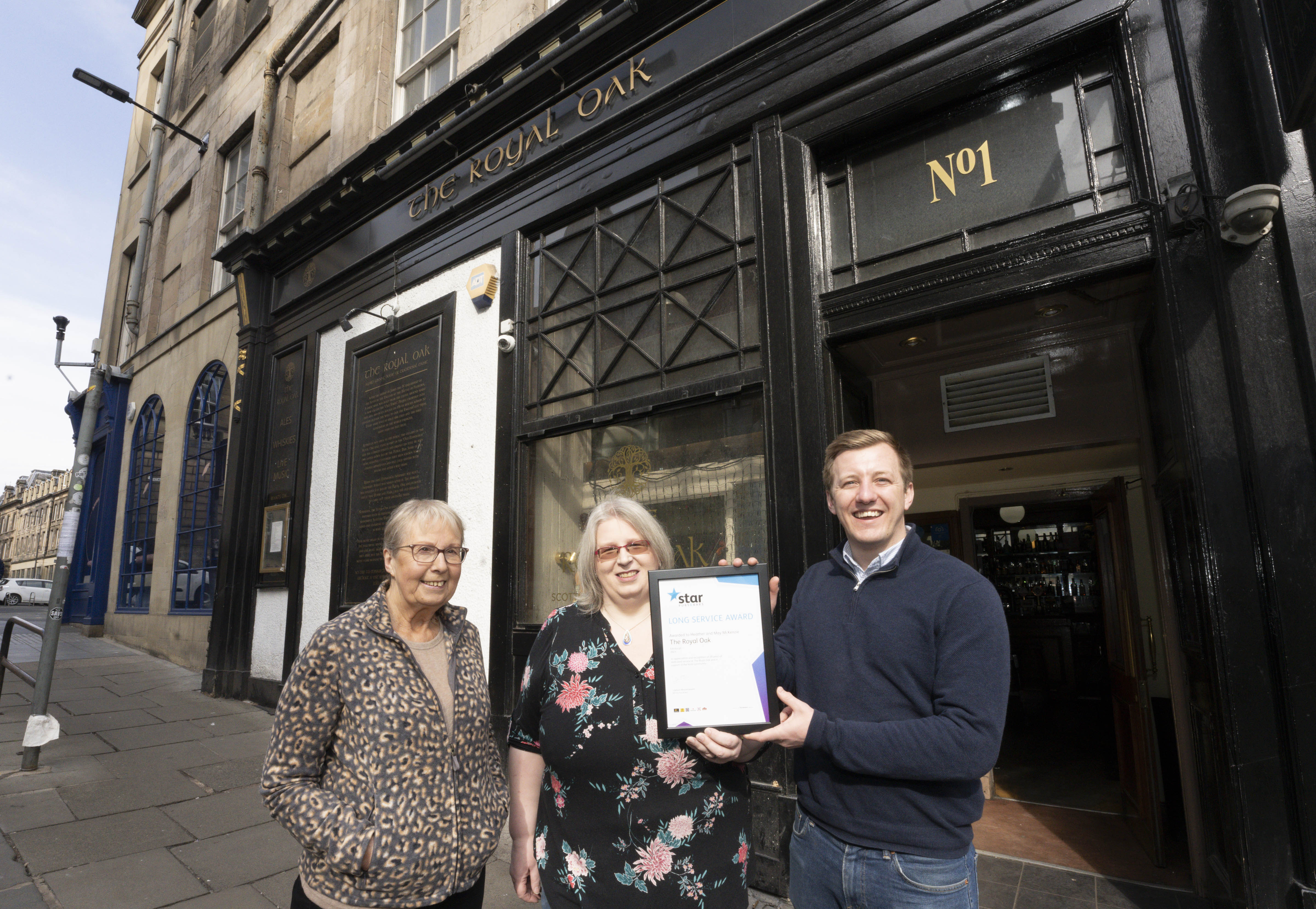 Publicans of Iconic Edinburgh Music Pub Receive Prestigous Award to Mark Their Anniversary