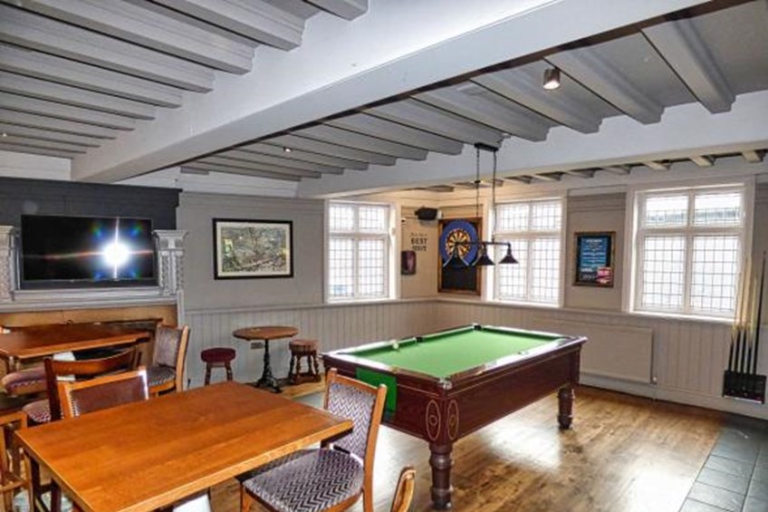 Seating area with pool table