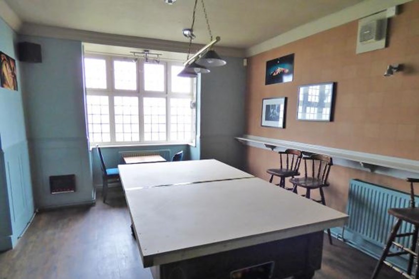 Pool table with cover on top