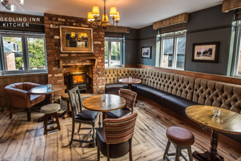 Dining area with chairs, stools and bench seating