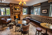 Dining area with chairs, stools and bench seating