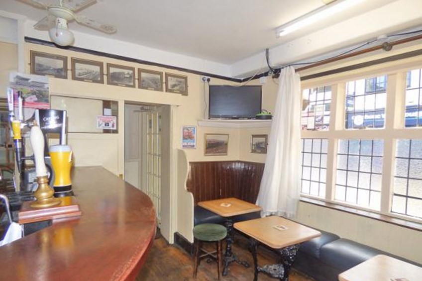 Seating area with booth and tables